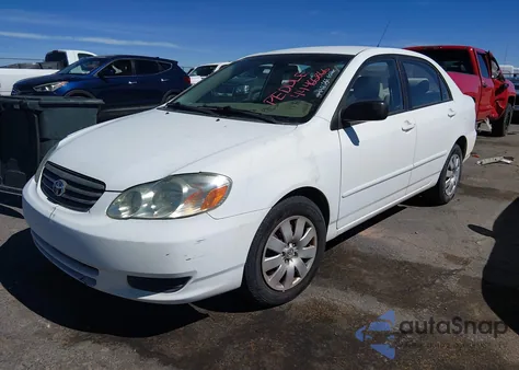 2003 Toyota Corolla Le z USA, uszkodzony, nr VIN JTDBR32E730017228
